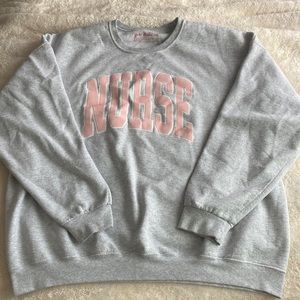 Pink and light grey nurse crewneck sweatshirt
